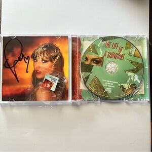 Taylor swift signed the life of a showgirl album cd